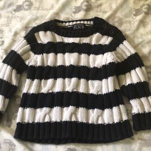 Blue and white cable knit sweater